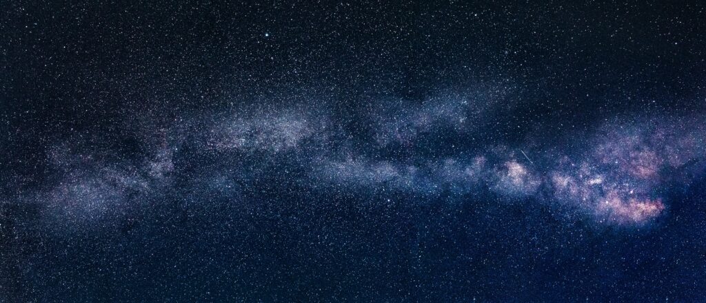 pexels-photo-1205301-1205301 Captivating view of the Milky Way galaxy across a clear starry night sky.